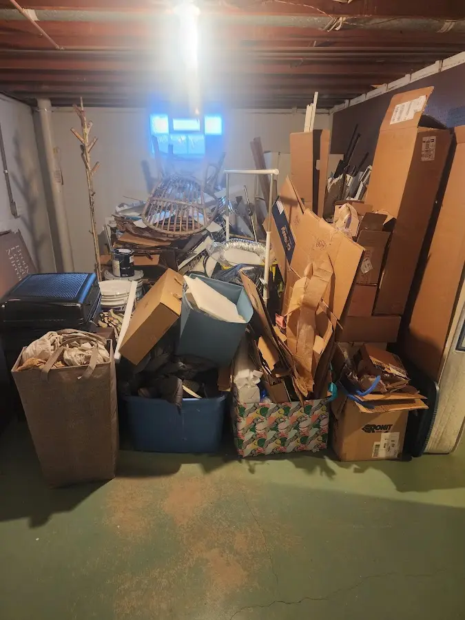 Roll-off dumpster container at job site for 20 Yard Dumpster Rental in Sawmills